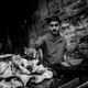 A samosa seller near Zainab Market, one of Karachi’s largest and oldest commercial buildings, readies for the tea-time rush.